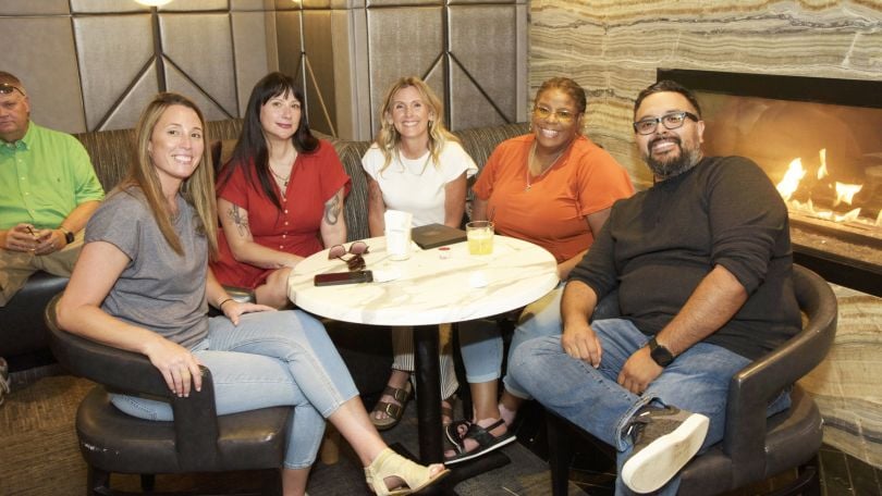Allwyn employees pose together