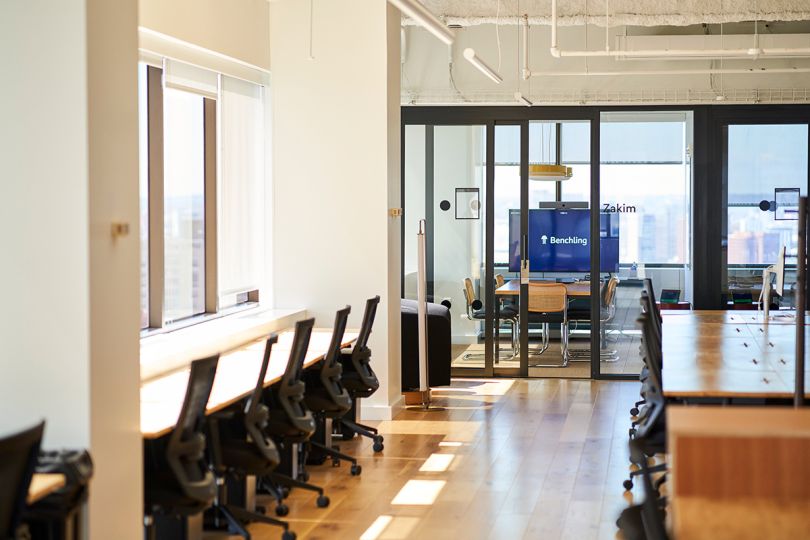 Conference room in the Benchling office with a large monitor displaying the company logo