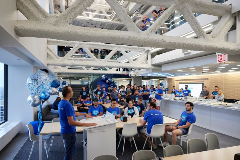 The Chicago IMC Trading team gathers in their offices.