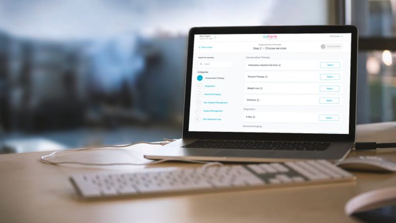 Cohere Health software on a laptop