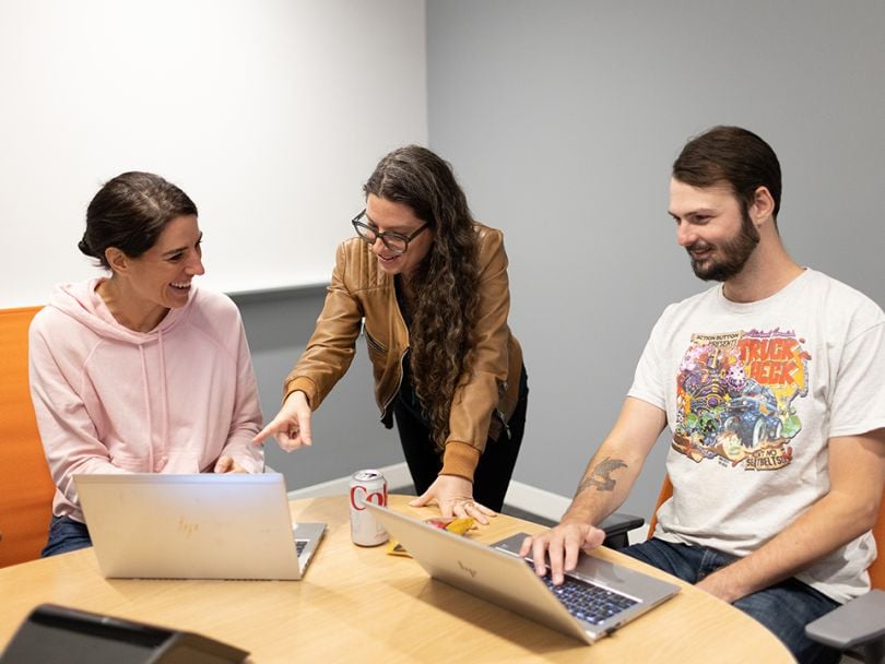 The Core Digital Media team collaborating in the office