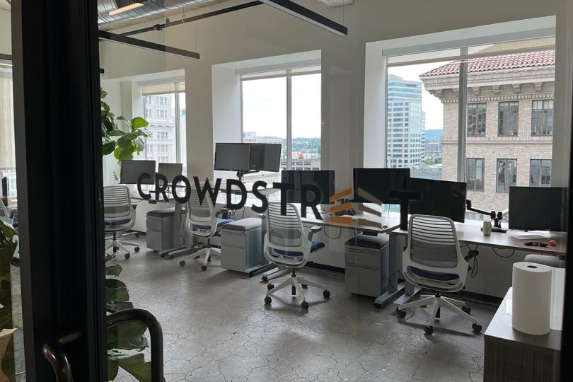 CrowdStreet logo on a glass door in the office