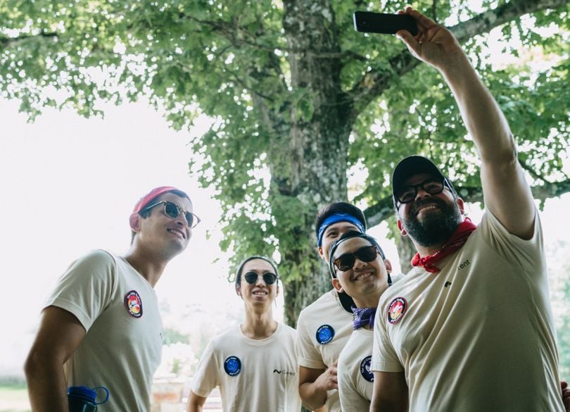 Current team members taking a selfie out on a hike