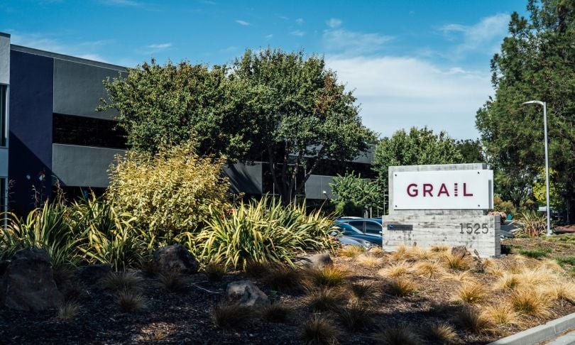 Exterior photo of GRAIL office building with signage and greenery. 