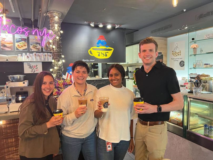 DailyPay team members at a coffeeshop together