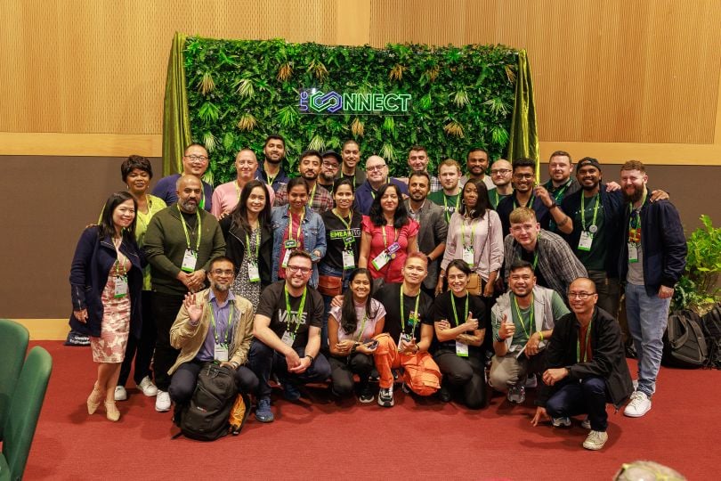 ServiceNow employees taking a group photo at the UTG Connect photo booth.