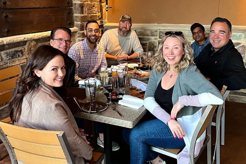 FourKites team members at a restaurant together