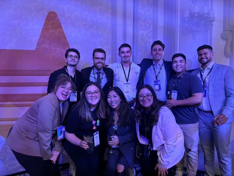 GitLab Account Executive Eddy Popat for a group photo with several of his colleagues during the company’s annual sales kickoff in Las Vegas