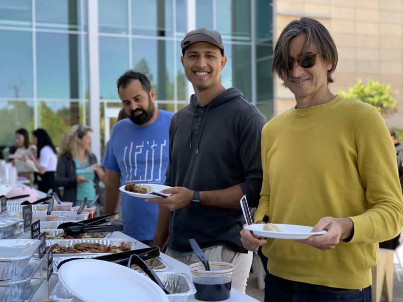 next insurance team members at an event