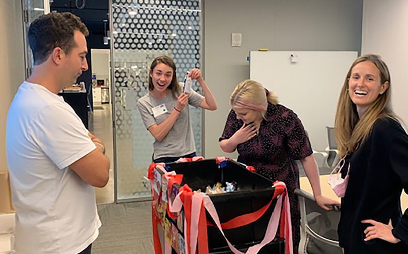 Harry's team members in the office kitchen