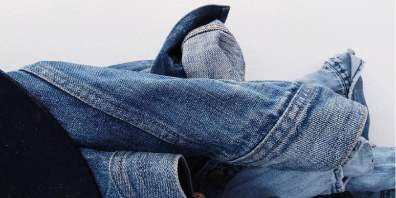 A screenshot of Huue's website showing a pair of jeans that were dyed using natural dyes.