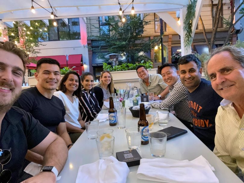 A group of Instawork employees dine outside.