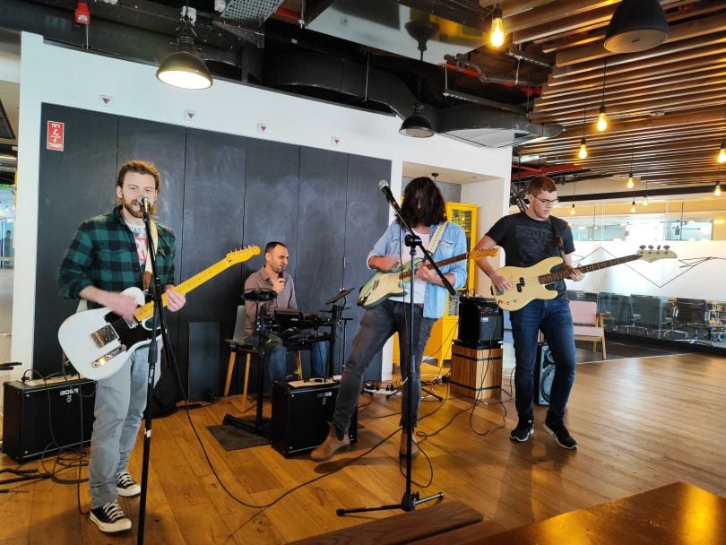 Photo of a band playing at Sisense’s office