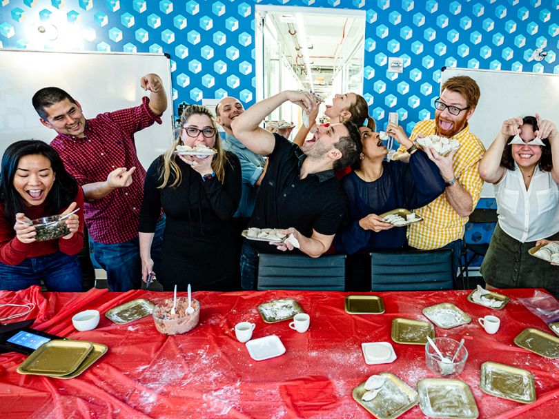 Bluecore team members decorating cookies