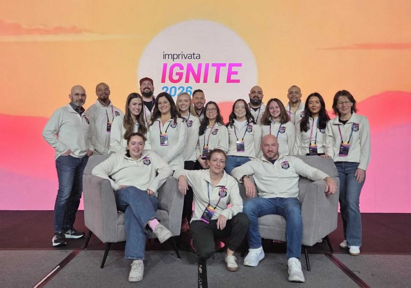 Several Imprivata team members pose for a group photo during the company’s 2026 Ignite event