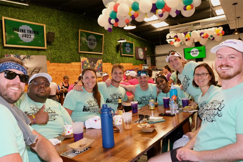 Iodine team members at a restaurant together