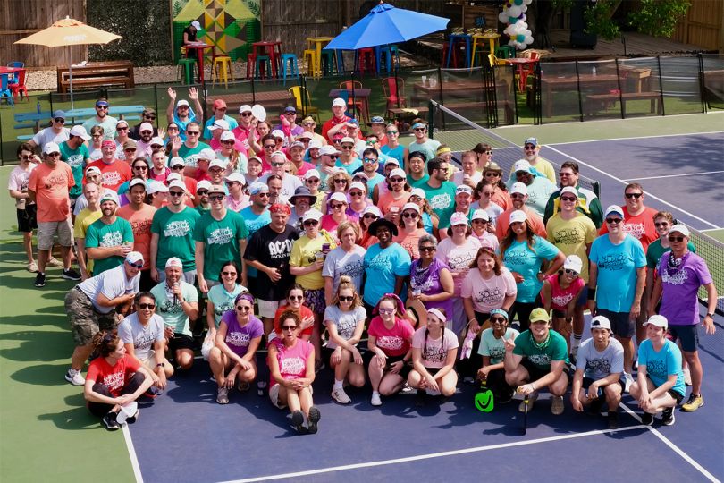 Iodine group photo on a pickleball court