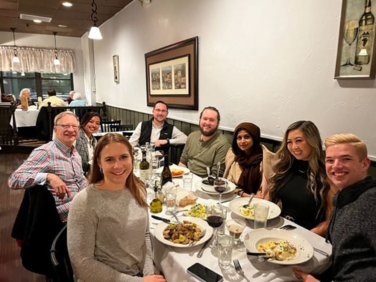 Leyton team members at a restaurant together