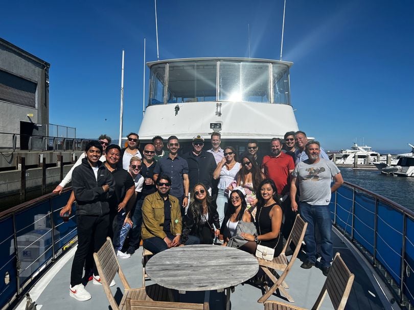 Leyton team photo on a boat