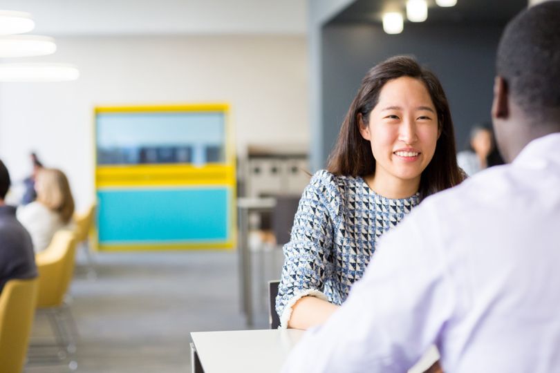 Smiling Liberty Mutual team member in the office