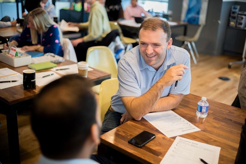 Two Liberty Mutual team members having a meeting in the office