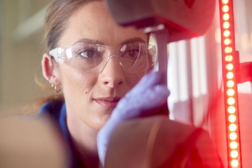 Markforged team member working wearing safety goggles 