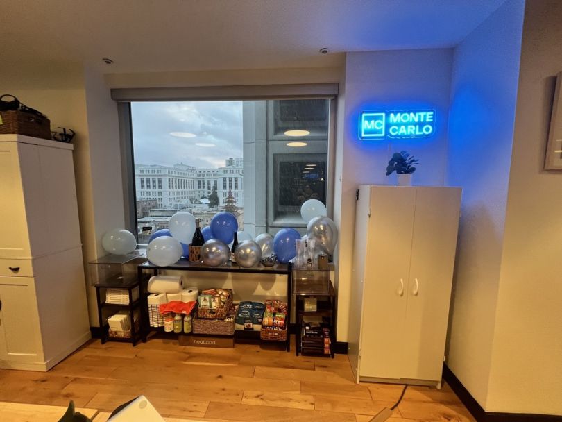  Balloons, snacks and other party materials sit beneath a window in the Monte Carlo office.