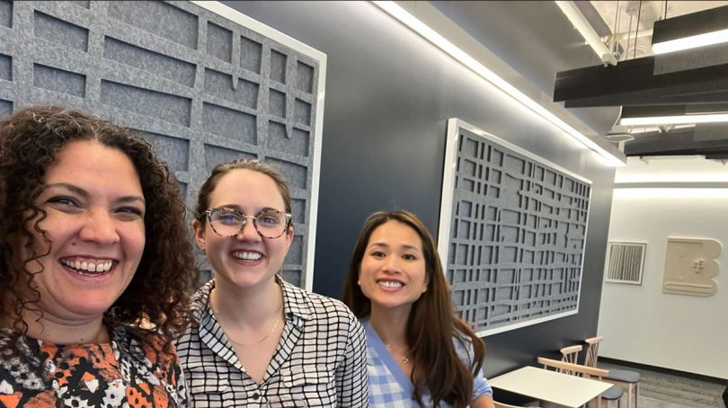 Nothwestern team members smiling in the office