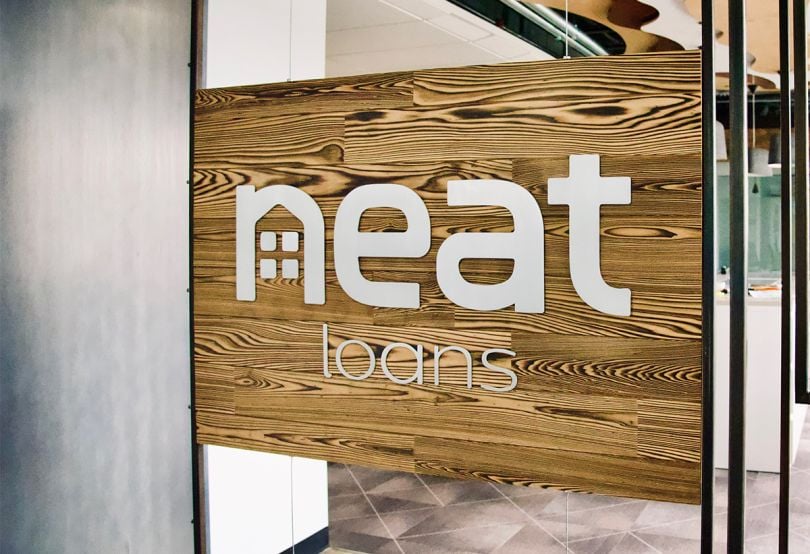 Neat Loans sign in office