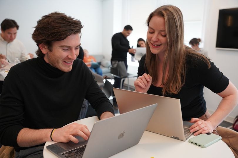 Members of the Expert Institute team collaborating in the office