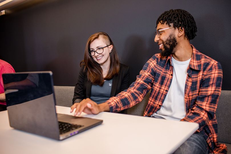 Productive Edge team members working on a project together