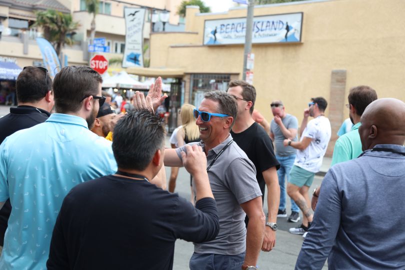 Traffic Tech team members celebrate outside the office