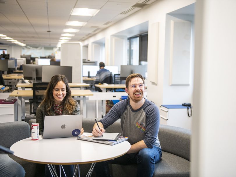 Remitly team members working together at the company's offices