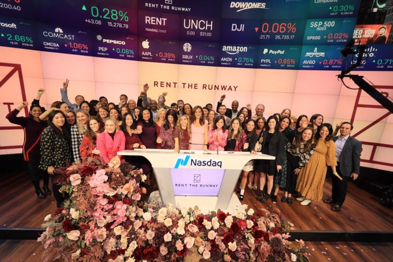 The Rent the Runway team poses at NASDAQ
