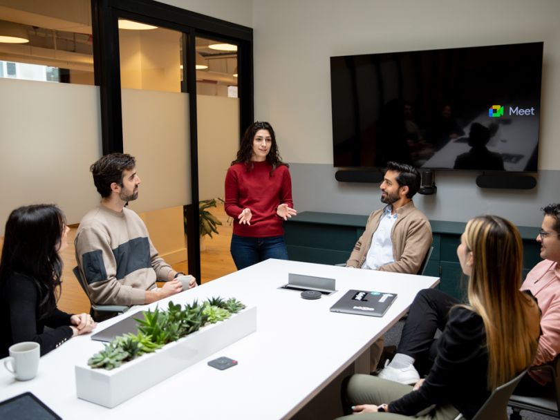 Reonomy coworkers having a strategy meeting at the office