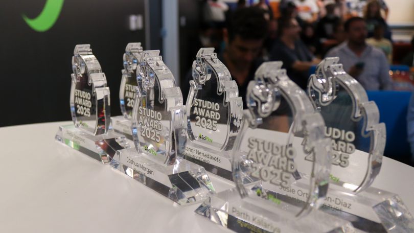 SciPlay awards on a table. 