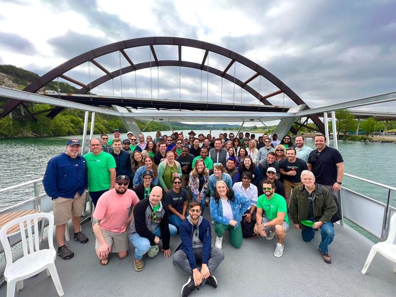 SourceDay team members on a boat