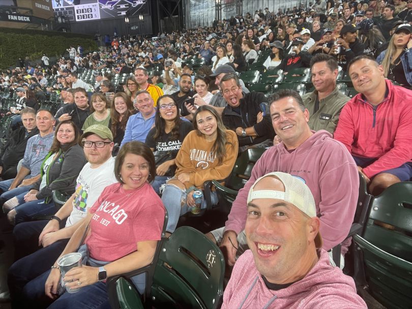 A group of CDS employees enjoy a Red Sox game