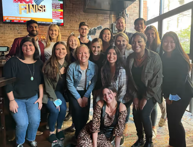 Group photo of HealthJoy team members out at a bar