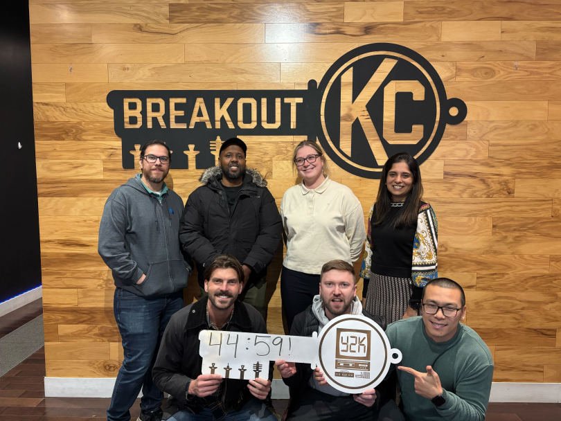 Several TrueML team members pose for a group photo after completing a breakout room challenge