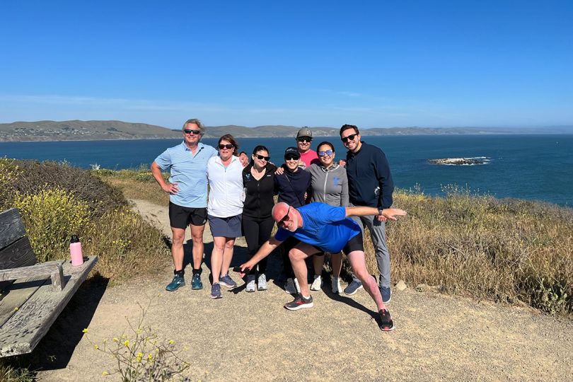 Viz.ai team members team photo outside by a lake