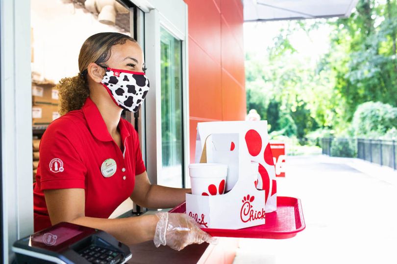 Chick-fil-A worker at drive thru window