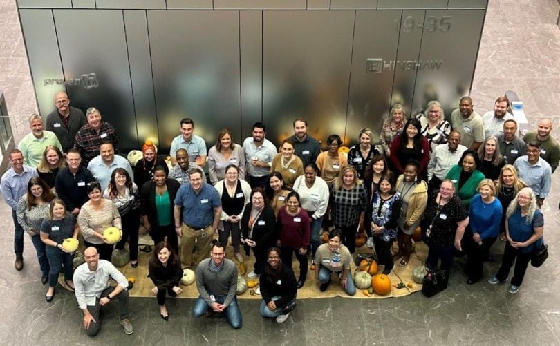 CNA team members pose for a group photo. 