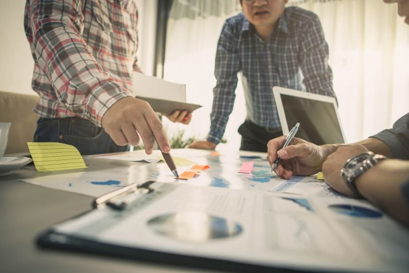 creatives collaborating at a table