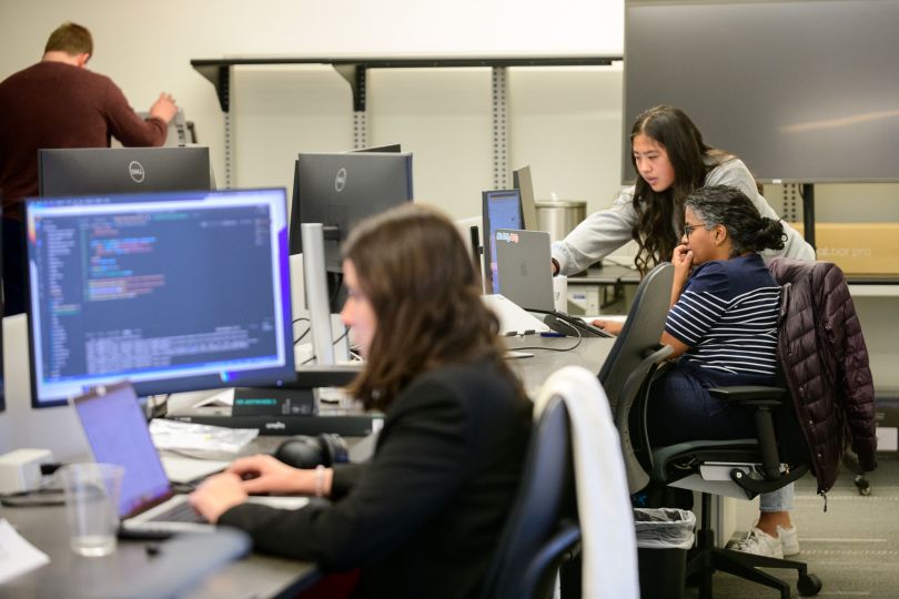 Photo of CarGurus’ Data Science team at work on computers