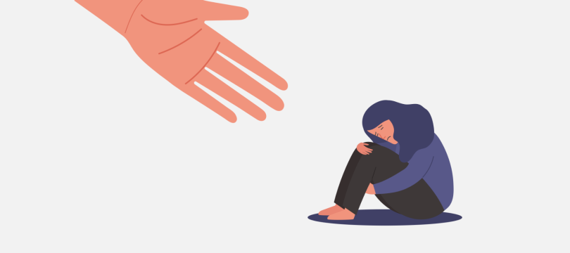 The large hand of an employer reaching out to a mourning employee.