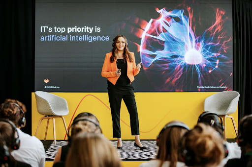 Nabitha Rao speaking on stage at the European Women in Technology conference in Amsterdam.