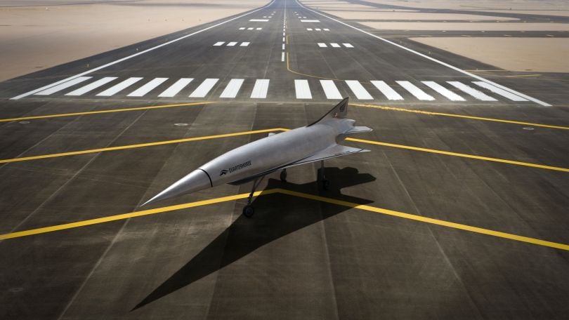 Quarterhorse sits on a runway.