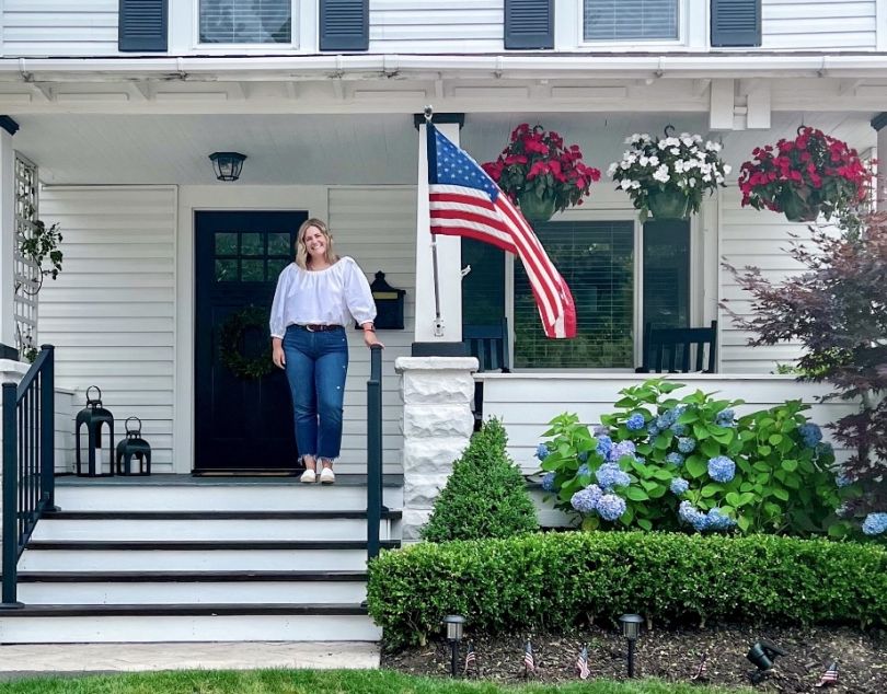 O’Neill in front of her home