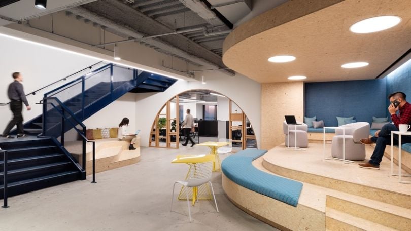 A colorful multilevel working space at Justworks.